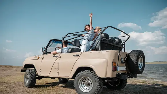friends-having-fun-traveling-by-car_23-21487718231